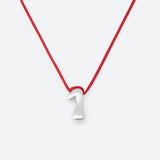 COLLIER AVEC UN NUMÉRO