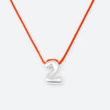 COLLIER AVEC UN NUMÉRO