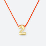 COLLIER AVEC UN NUMÉRO