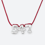 COLLIER AVEC TROIS NUMÉROS