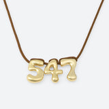 COLLIER AVEC TROIS NUMÉROS