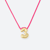 COLLIER AVEC UN NUMÉRO