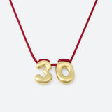COLLIER AVEC DEUX NUMÉROS