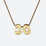 COLLIER AVEC DEUX NUMÉROS
