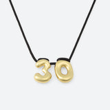COLLIER AVEC DEUX NUMÉROS