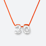 COLLIER AVEC DEUX NUMÉROS