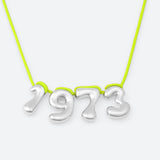 COLLIER AVEC QUATRE NUMÉROS