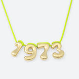 COLLIER AVEC QUATRE NUMÉROS
