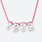COLLIER AVEC QUATRE NUMÉROS