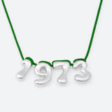 COLLIER AVEC QUATRE NUMÉROS