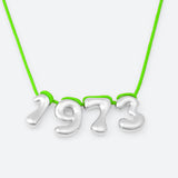 COLLIER AVEC QUATRE NUMÉROS