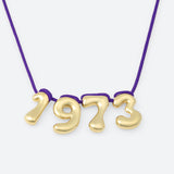 COLLIER AVEC QUATRE NUMÉROS