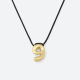 COLLIER AVEC UN NUMÉRO